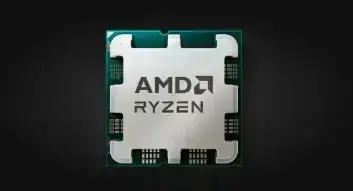 An image of an AMD Ryzen processor -, the processor is unamed other than AMD RYZEN in AMD's brand style for our post: AMD Ryzen 7 9800X3D Review: The Best Gaming Processor Yet?